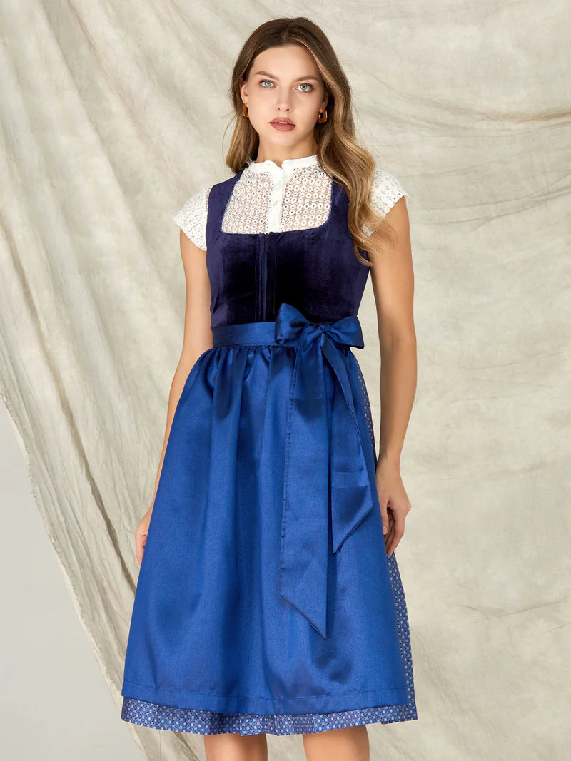 Die Schönheit der Samt - Dirndl in verschiedenen Blautönen und Grün