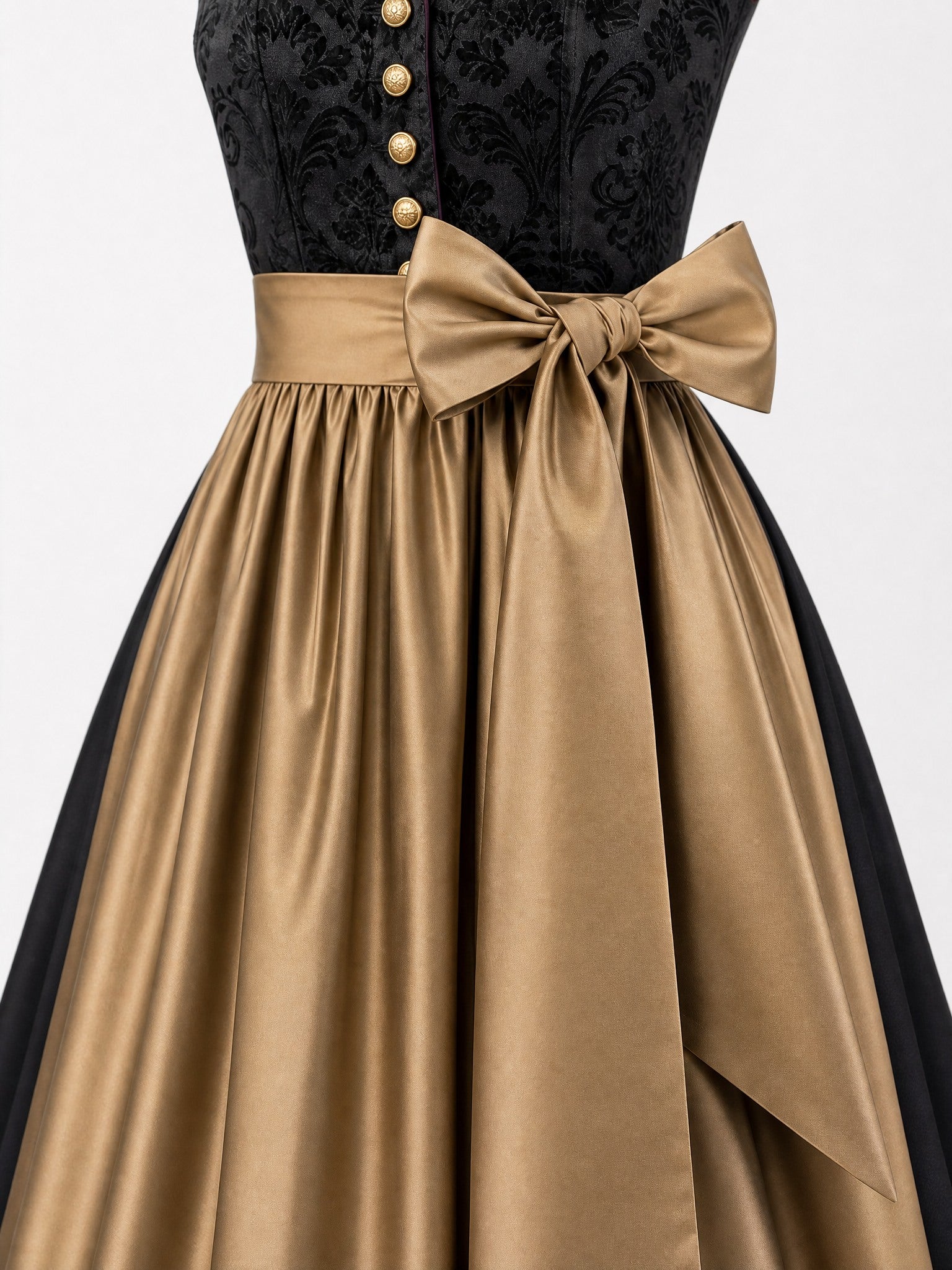 Dirndl Klara in Anthrazit mit Antikgold Schürze - Detailansicht Taille und Schleife