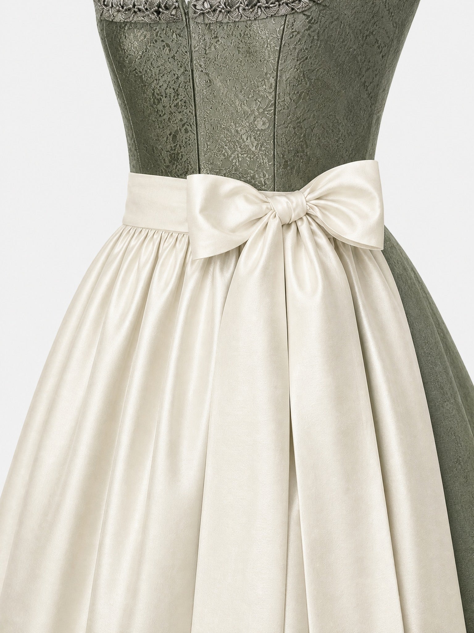Dirndl Thea in Mineralgrün mit Elfenbein Schürze - Detailansicht Taille und Schleife